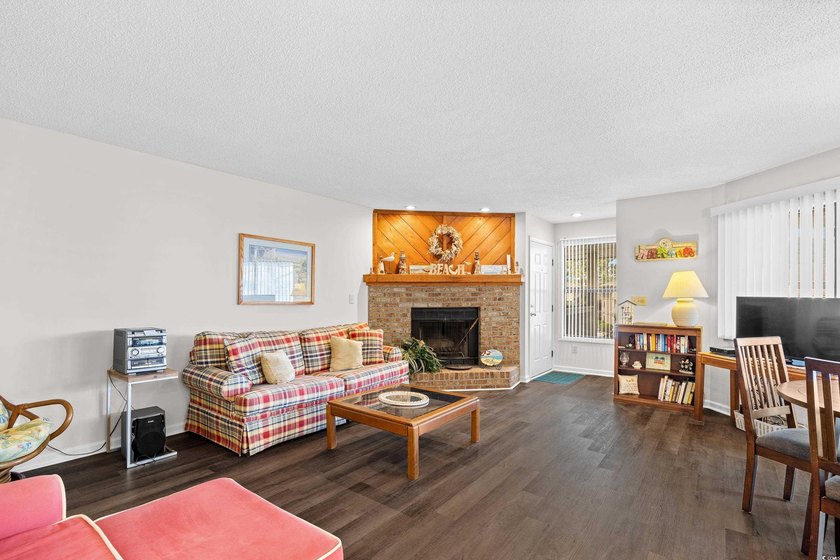 Welcome to effortless coastal living in this beautifully updated - photo 3