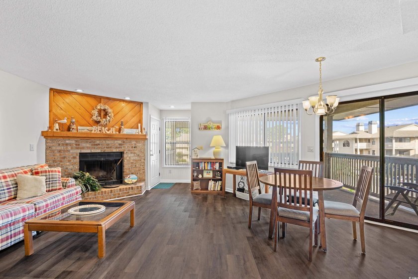 Welcome to effortless coastal living in this beautifully updated - photo 4