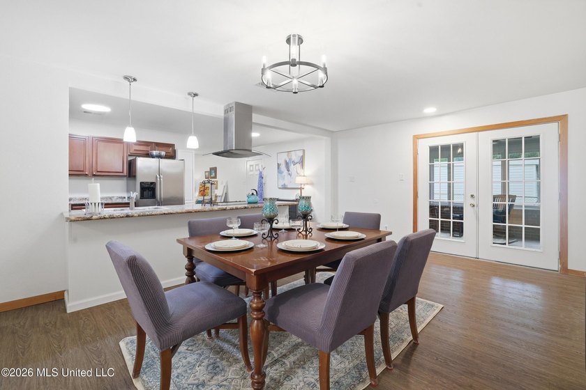 Welcome home to this surprisingly spacious 4 bedroom, 2 bath - photo 14