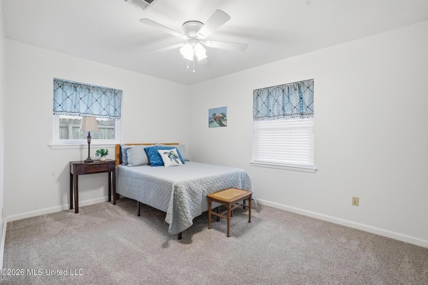 Welcome home to this surprisingly spacious 4 bedroom, 2 bath - photo 19