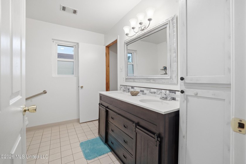 Welcome home to this surprisingly spacious 4 bedroom, 2 bath - photo 26