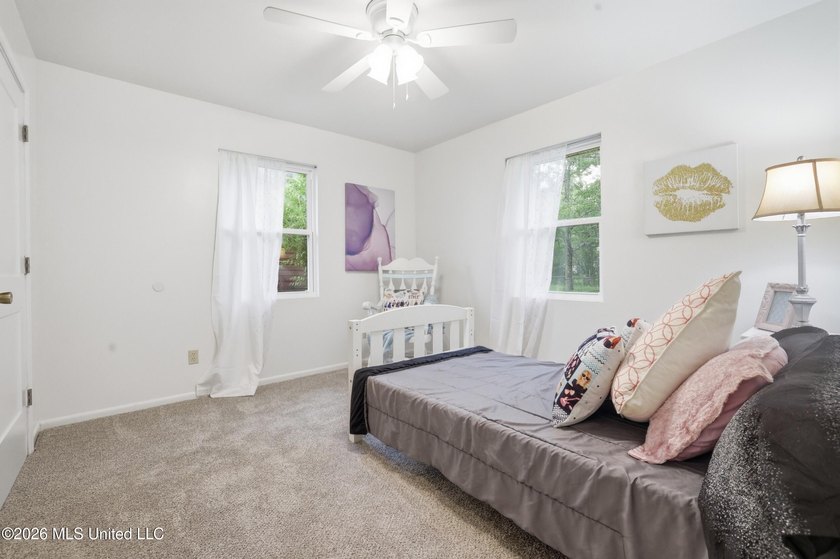 Welcome home to this surprisingly spacious 4 bedroom, 2 bath - photo 28