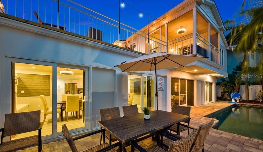 Perfectly positioned within the exclusive waterfront enclave of - photo 7