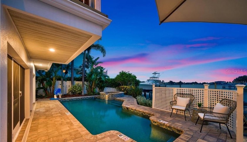 Perfectly positioned within the exclusive waterfront enclave of - photo 8