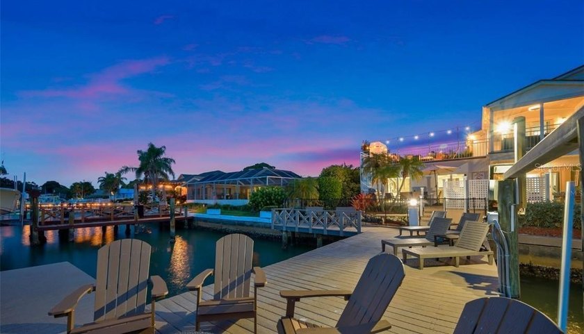 Perfectly positioned within the exclusive waterfront enclave of - photo 10