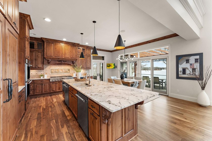 Experience the pinnacle of lakeside luxury with this - photo 30