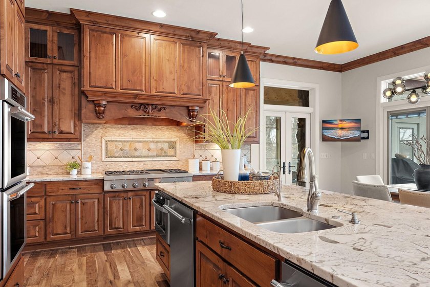 Experience the pinnacle of lakeside luxury with this - photo 33