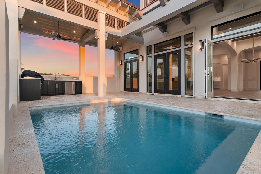 Less than a mile from the beach! Finishes and details are - photo 2