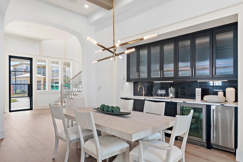 Less than a mile from the beach! Finishes and details are - photo 4
