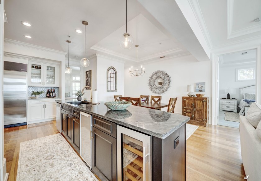 This extraordinary waterfront end unit condo, nestled in the - photo 8
