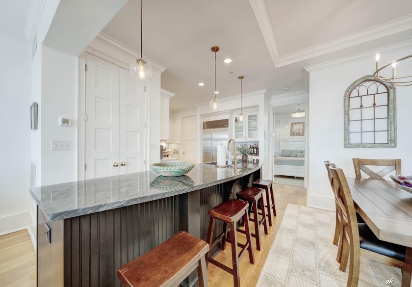 This extraordinary waterfront end unit condo, nestled in the - photo 9