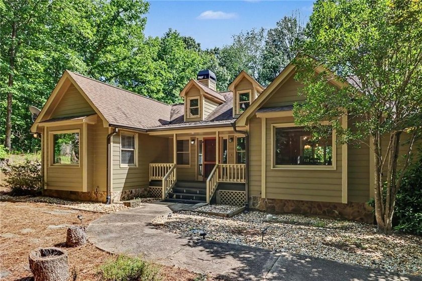 Nestled in a private, picturesque setting, this exceptional - photo 3