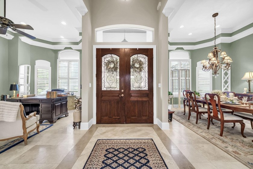 Welcome to an exceptional lakefront residence in the prestigious - photo 5