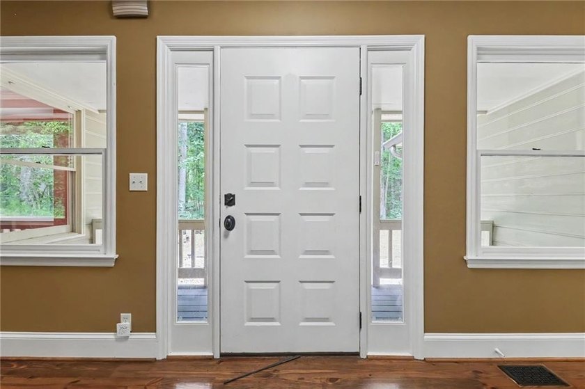 Nestled in a private, picturesque setting, this exceptional - photo 6