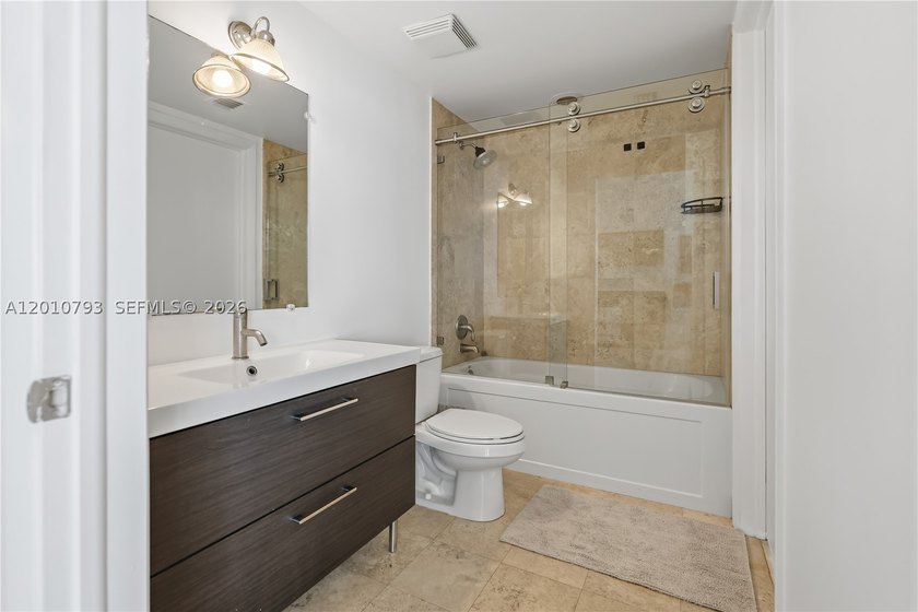 Experience the pinnacle of Miami living in this stunning - photo 11