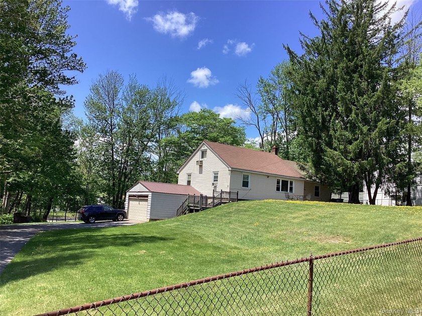 Welcome to this spacious and inviting ranch-style home nestled - photo 2