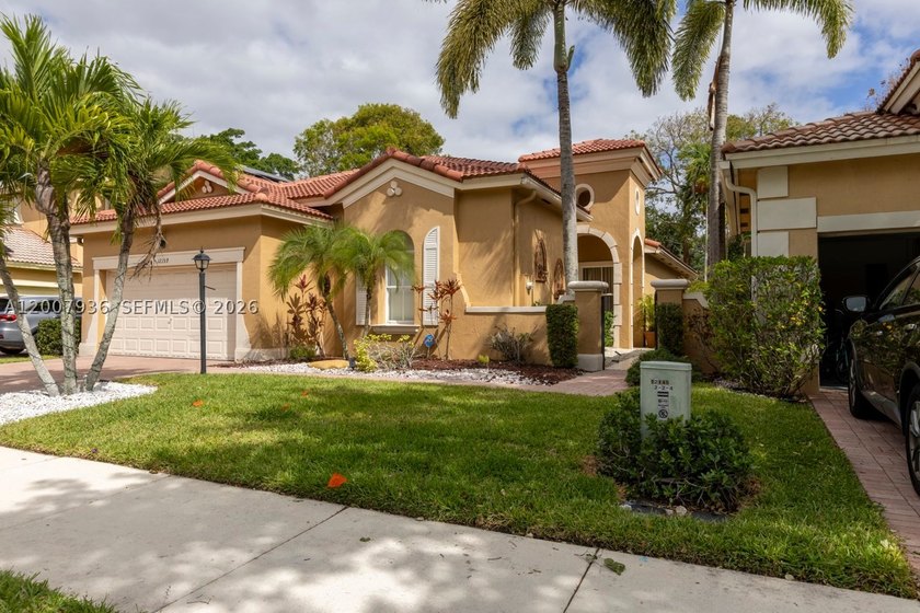 Beautiful one story home in Heron Bay COMPLETELY RENOVATED with - photo 6