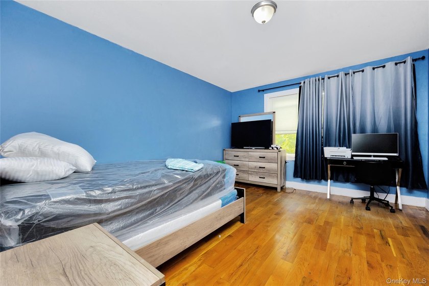 Built in 2021, this legal two-family brick duplex offers a rare - photo 12