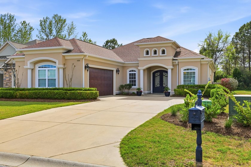 Beautiful 4 bedroom, 3 bath Mediterranean-style home located in - photo 2