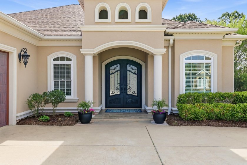Beautiful 4 bedroom, 3 bath Mediterranean-style home located in - photo 3