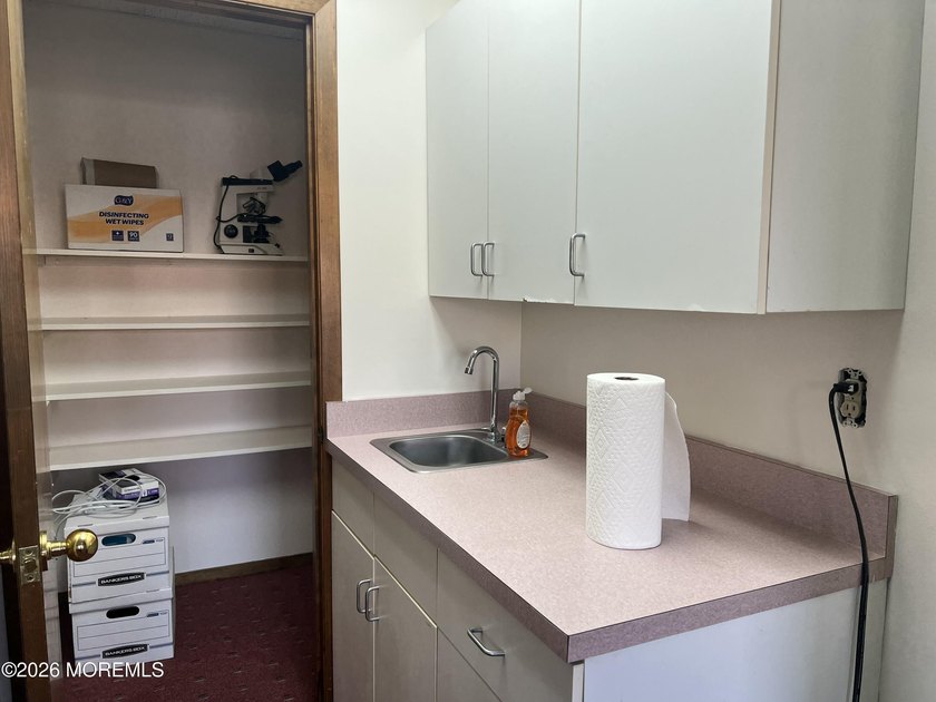Available a one-story end unit office condo. The unit features - photo 5