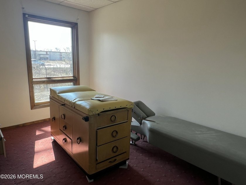 Available a one-story end unit office condo. The unit features - photo 8