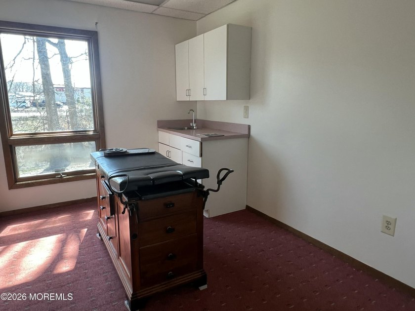Available a one-story end unit office condo. The unit features - photo 9