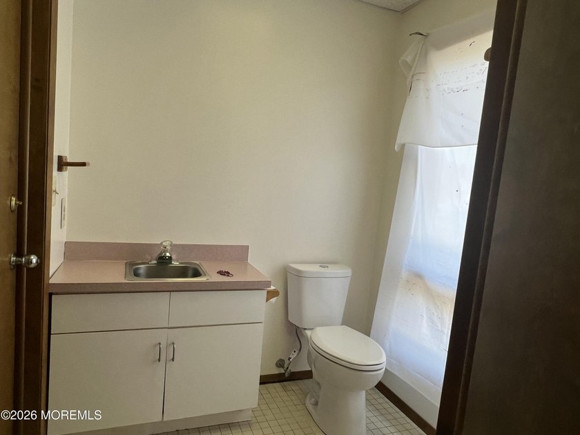 Available a one-story end unit office condo. The unit features - photo 10