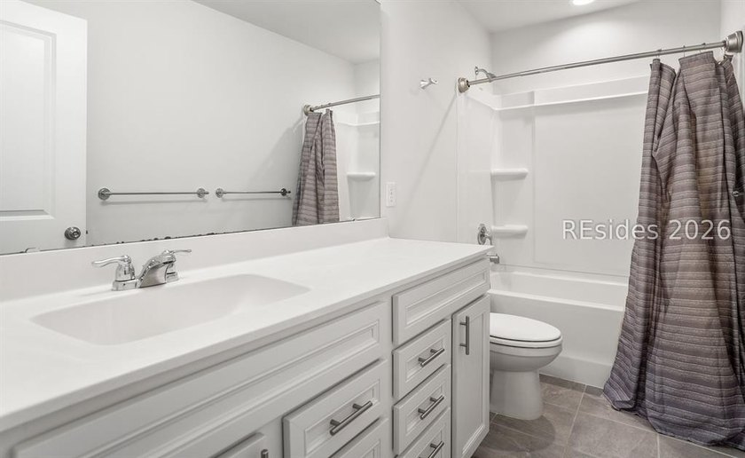 Welcome to 1 Toxaway Lane, where modern comfort meets Lowcountry - photo 23