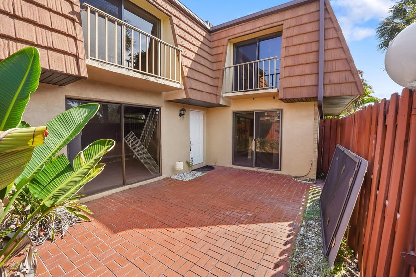 Step into this inviting two-story townhouse where comfort and - photo 3