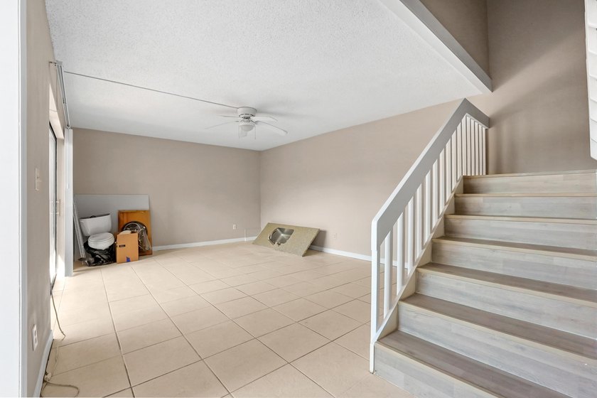 Step into this inviting two-story townhouse where comfort and - photo 4