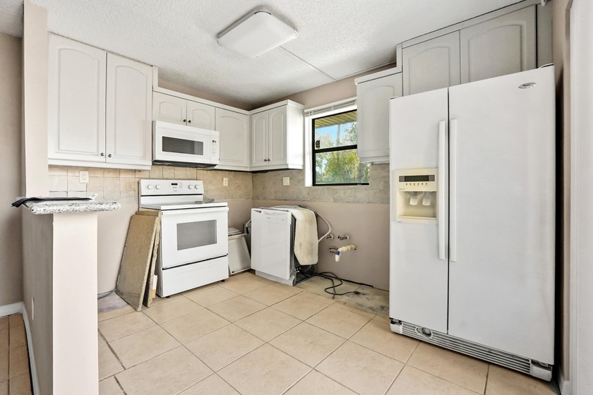 Step into this inviting two-story townhouse where comfort and - photo 7