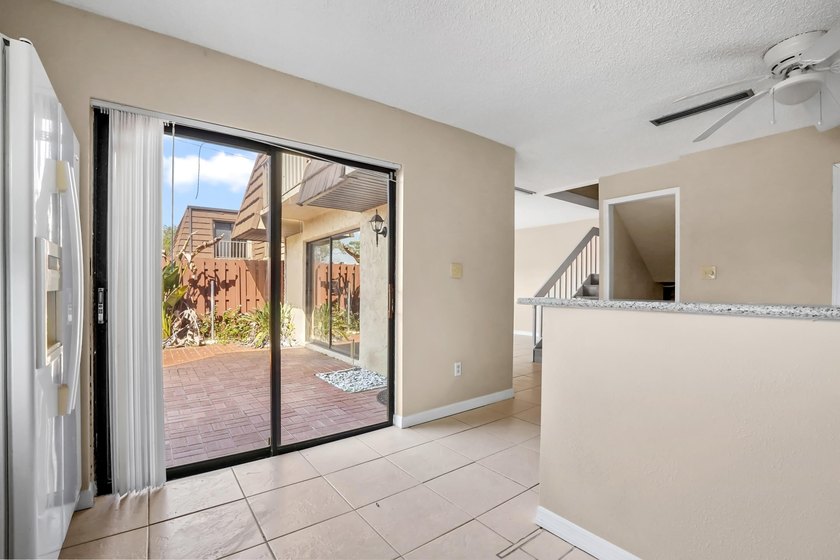 Step into this inviting two-story townhouse where comfort and - photo 9