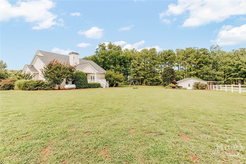Welcome to this exceptional single-level brick home in Colbert - photo 47