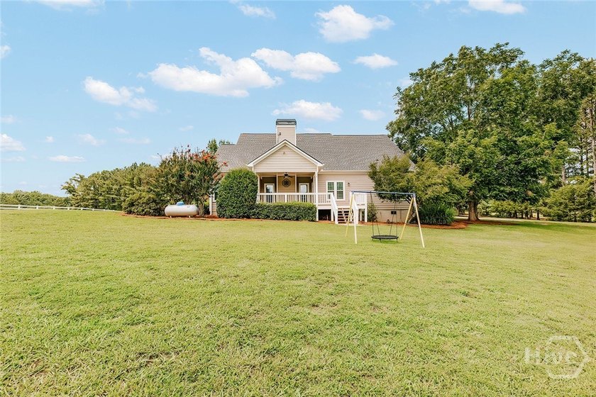 Welcome to this exceptional single-level brick home in Colbert - photo 48
