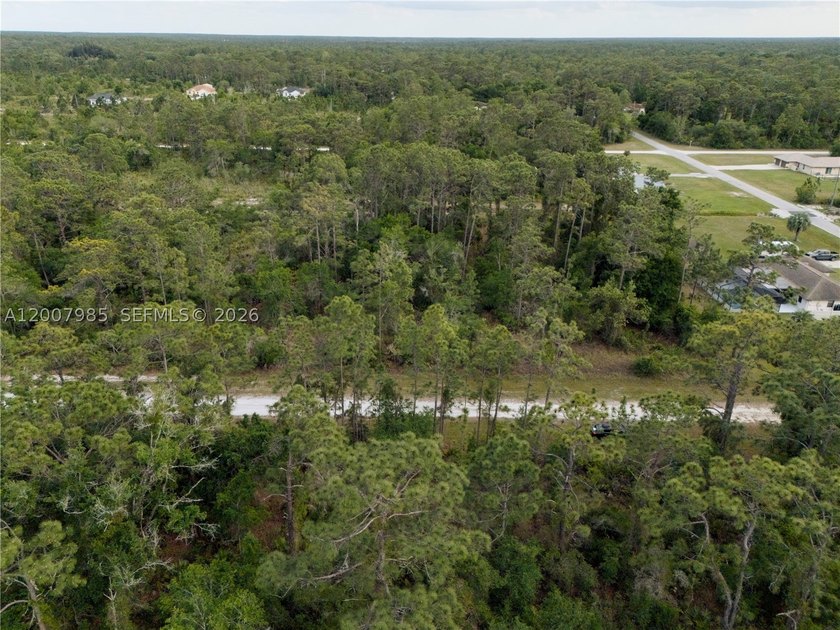 Build your dream home on this spacious 0.50-acre vacant lot - photo 5