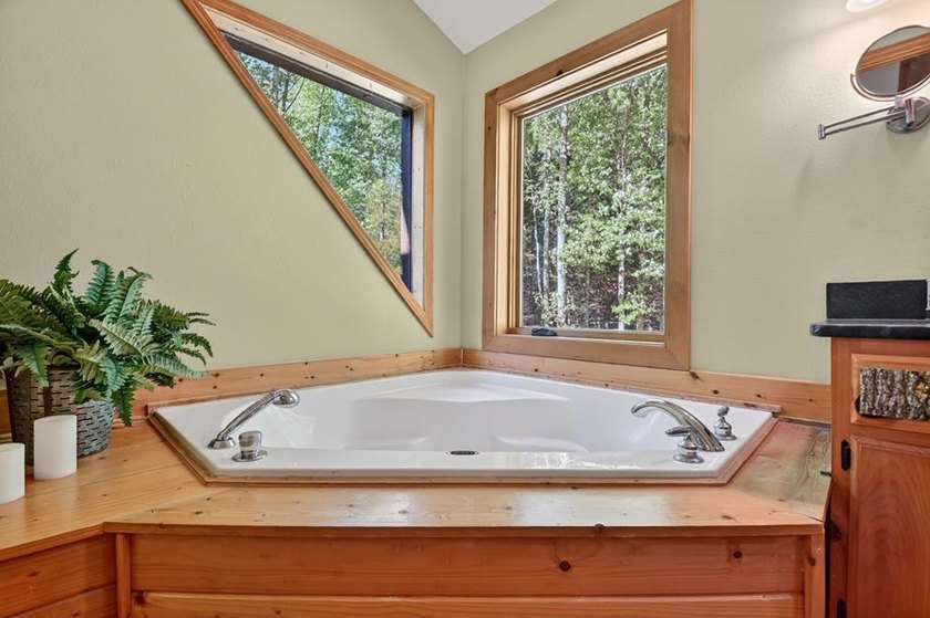 Tucked beneath a canopy of towering hardwoods and surrounded by - photo 19