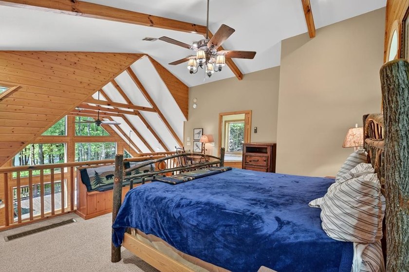 Tucked beneath a canopy of towering hardwoods and surrounded by - photo 21