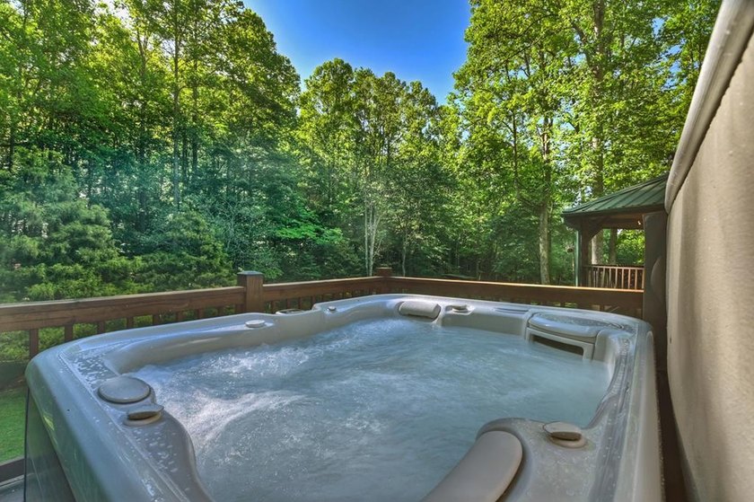 Tucked beneath a canopy of towering hardwoods and surrounded by - photo 38