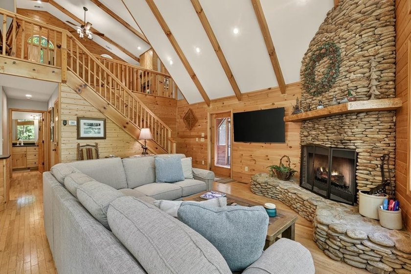 Tucked beneath a canopy of towering hardwoods and surrounded by - photo 39