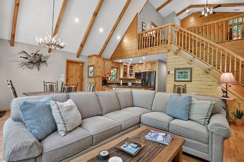 Tucked beneath a canopy of towering hardwoods and surrounded by - photo 40