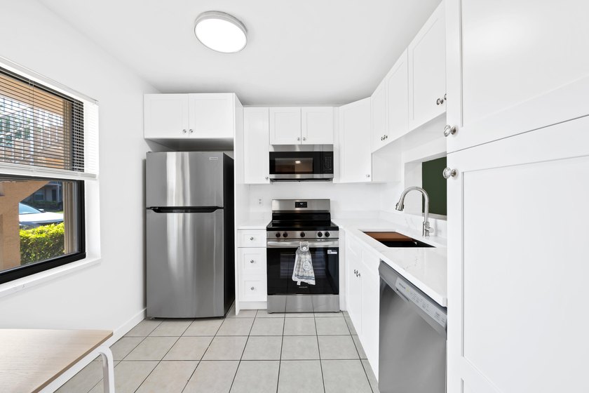 Look no further...This First Floor unit in an all age, tucked - photo 2