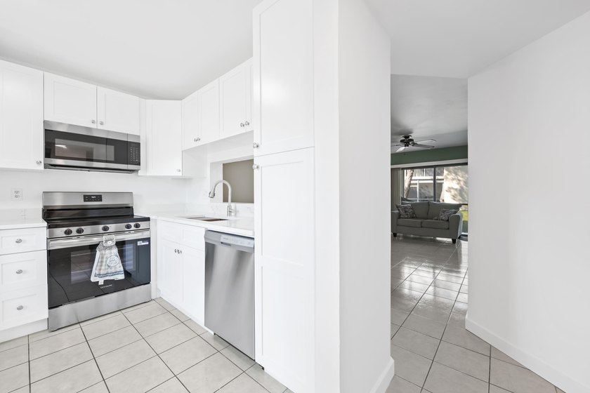 Look no further...This First Floor unit in an all age, tucked - photo 3