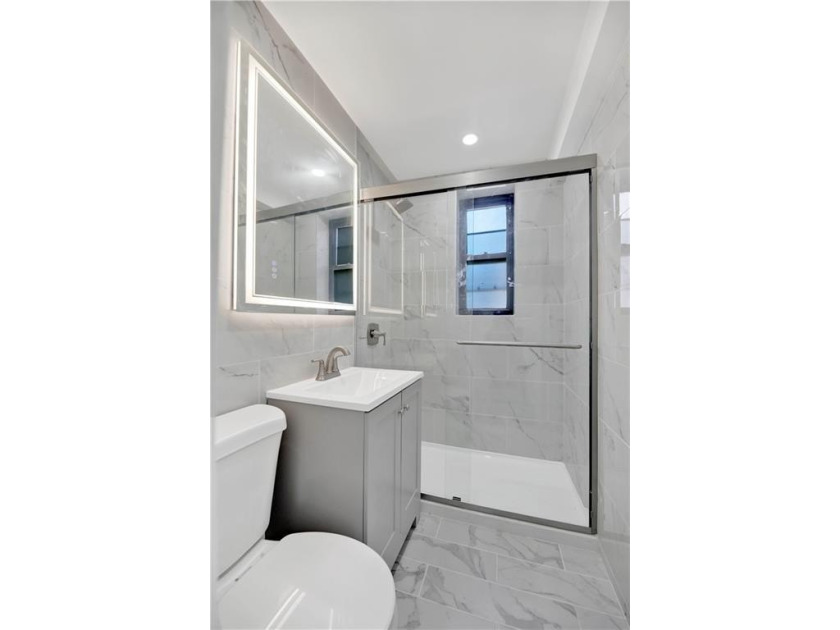 Welcome to this move-in ready first-floor studio co-op, offering - photo 19