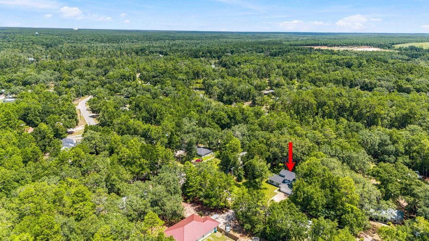 Private, well-kept 4BR/2.5BA home on a spacious lot in Magnolia - photo 7