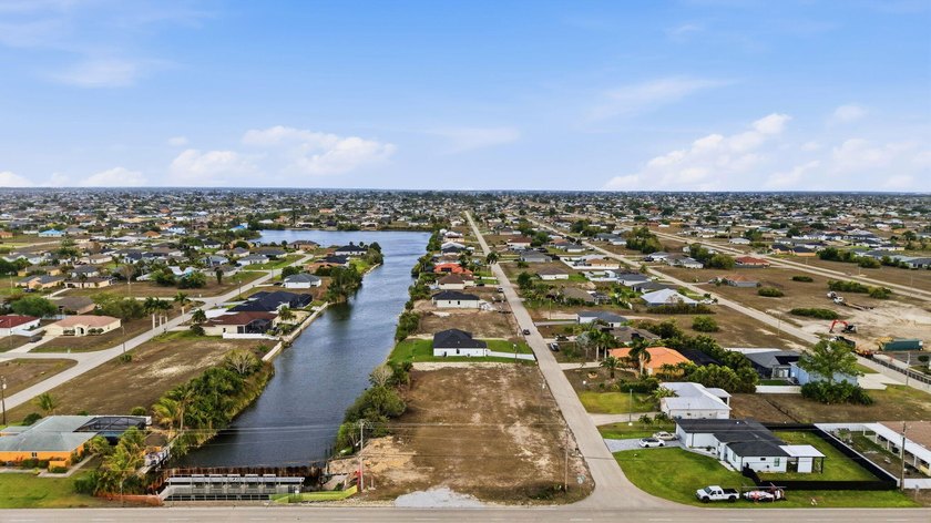 Clear lot on a freshwater canal in growing NW Cape Coral - photo 5