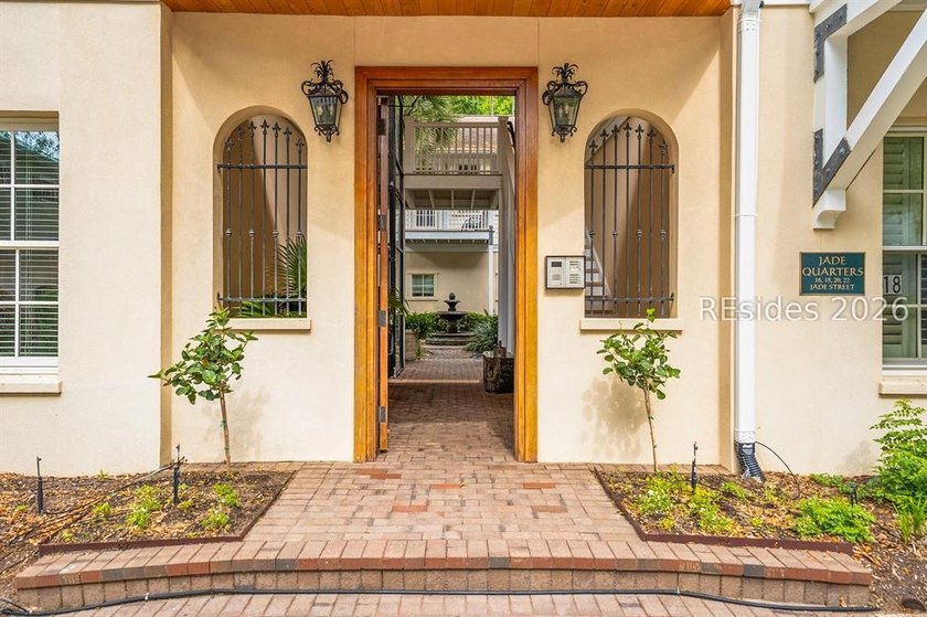 Welcome home to this luxurious lock-and-leave condominium in - photo 3