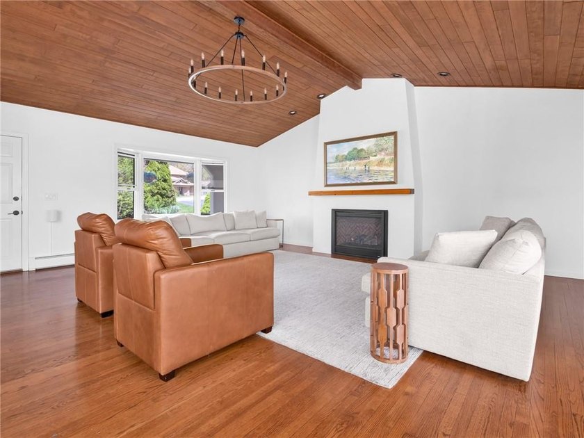 A circular driveway welcomes you to this elegant Colonial set on - photo 17