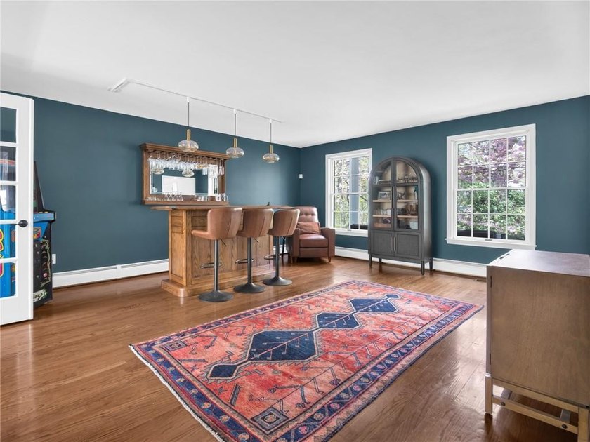 A circular driveway welcomes you to this elegant Colonial set on - photo 23