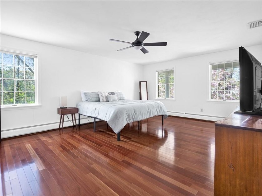 A circular driveway welcomes you to this elegant Colonial set on - photo 29